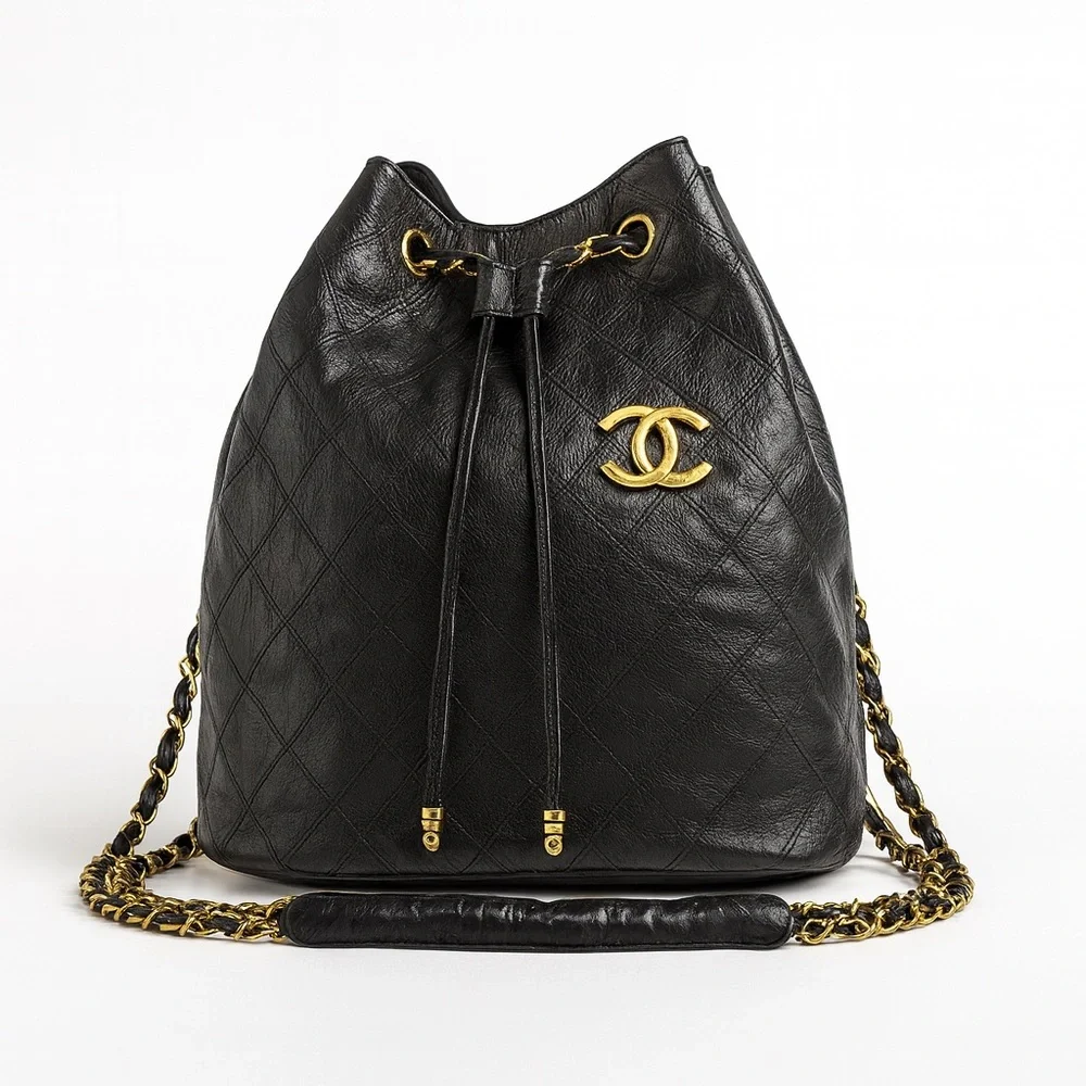 Vintage Chanel Black Lambskin Quilted CC Drawstring Bucket Bag Leather Backpack